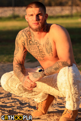 handsome straight rugged muscle tattoed jock Mac Lawler from GayHoopla on the beach